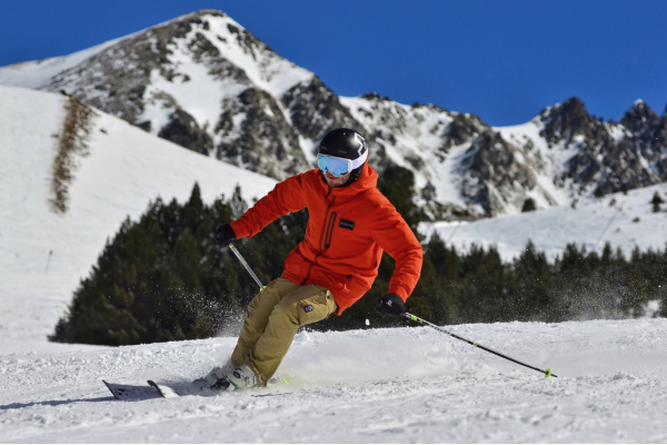 A man skiing in the snow outdoors