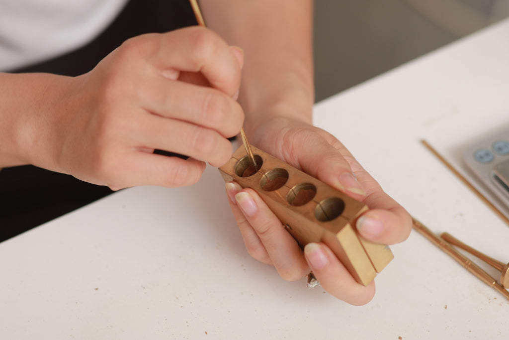 Making the bottom hole for incense waterfall cone