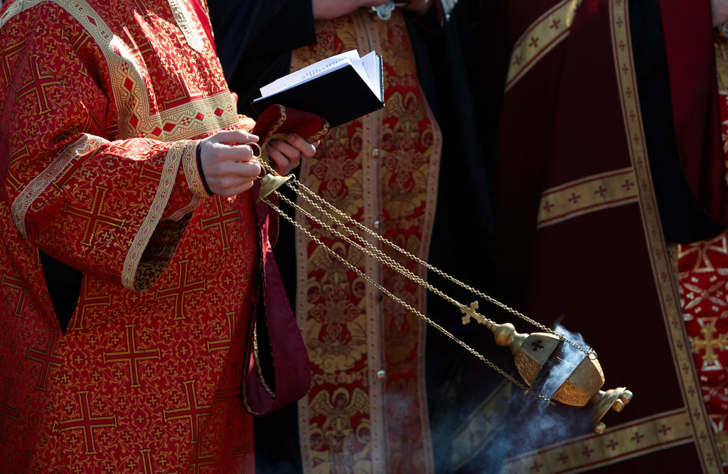 Swinging censer being used in Catholic Service