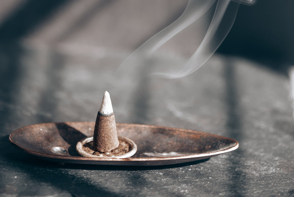 Incense cone burning