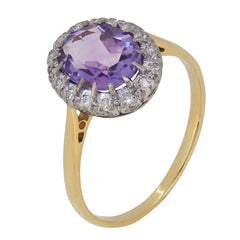 A mid-20th century, amethyst & diamond set cluster ring