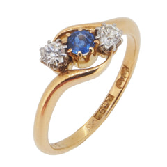 An early 20th century, 18ct yellow gold, sapphire & diamond set, three stone crossover ring