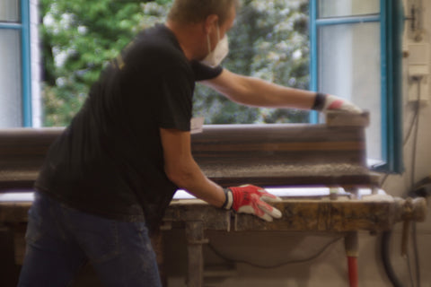 Steingraeber Employee Sanding A Grand Piano Fallboard