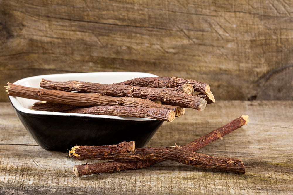 Licorice roots on a wooden table