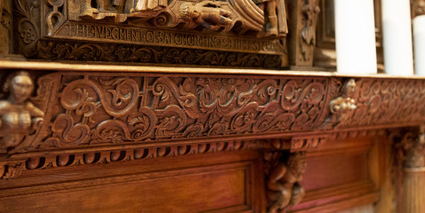 The decorative detail of the fireplace at Thornbridge Hall which has been used on can and bottle 