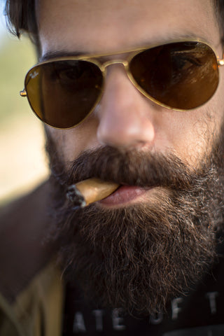 Bearded man with cigar