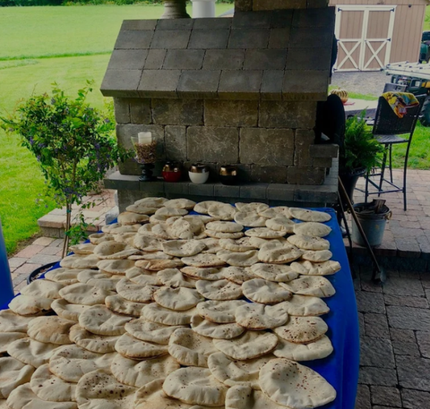 Chicago Brick Oven 1000 DIY Pizza Oven in Yard with pita breads