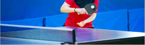 Women Playing on Ping Pong Table