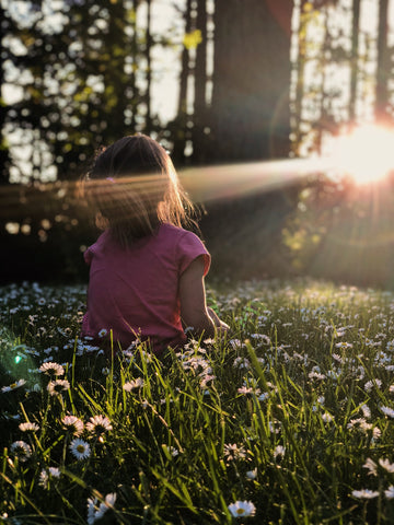 Girl enjoying the sun outside