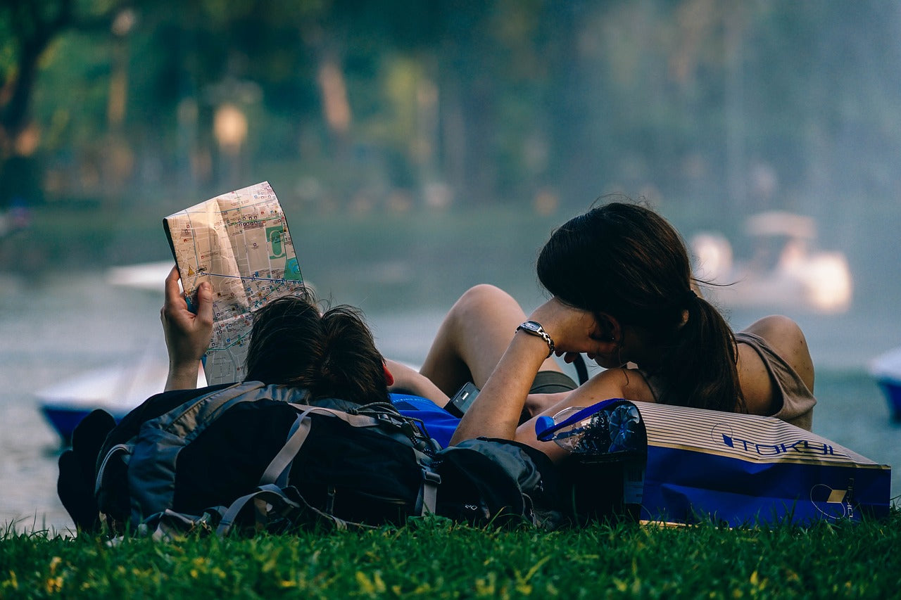 Couple lying outside together