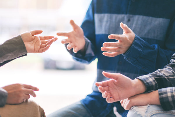 People having an animated conversation.