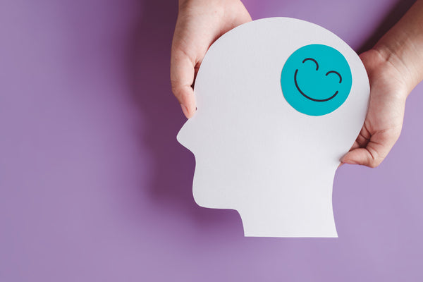 Symbolic happy brain showing improved mood after raising serotonin levels naturally