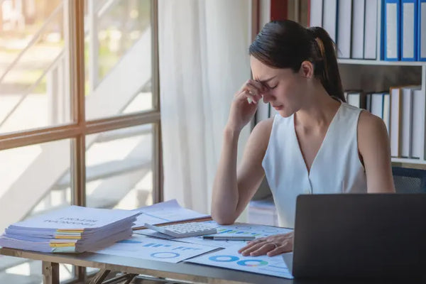 A person stressed by work and personal life.
