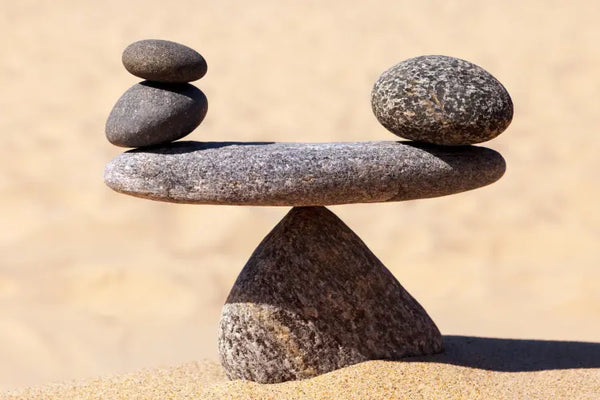 An image of balanced stones, representing various self-care activities.