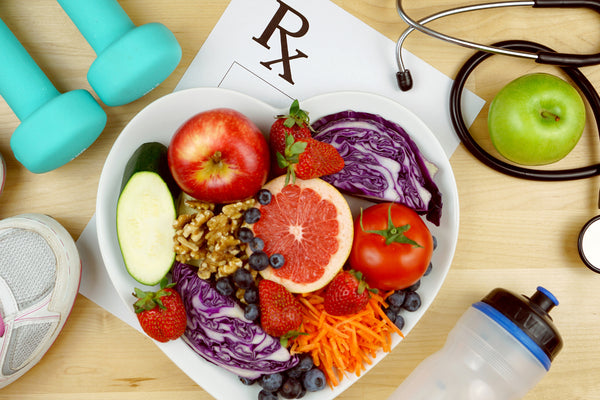 A plate filled with colorful fruits and vegetables.