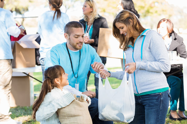 Volunteers receiving donation.