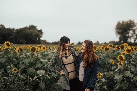 Laughing together with a friend relieves stress and improves mood