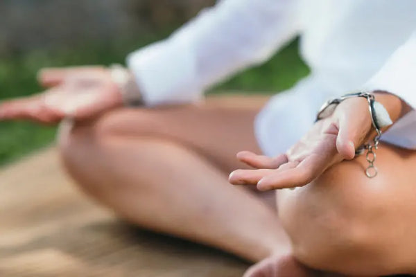 A person practicing mindfulness outdoors.