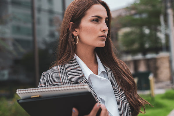 Woman who looks confident and firm.