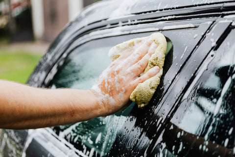 Help the people next door by offering to wash their car.