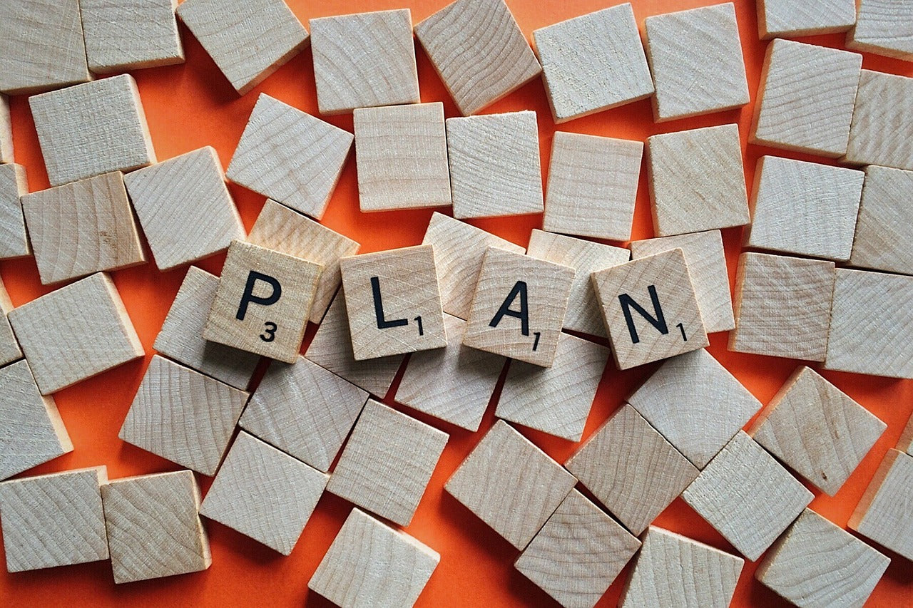 Letters spelling the word "plan"