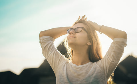 Woman smiling to herself