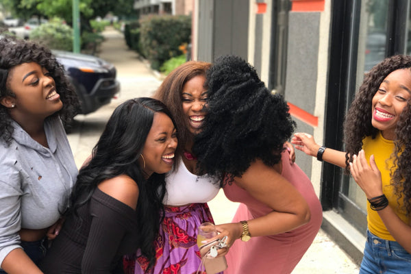 A group of friends laughing together.
