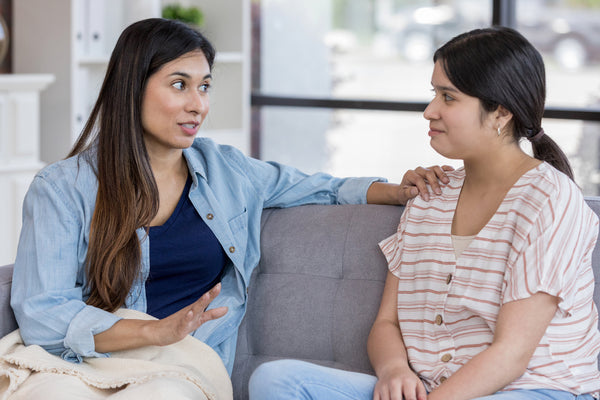 Two women talking about boundaries.