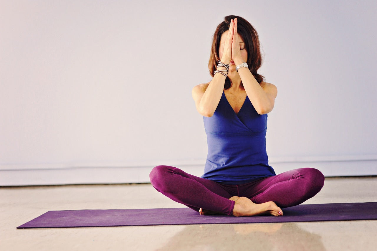 Person practicing yoga