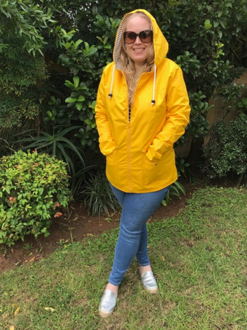 yellow raincoat silver lining gumboots front view