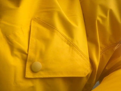 silver lining gumboots yellow raincoat pocket detail