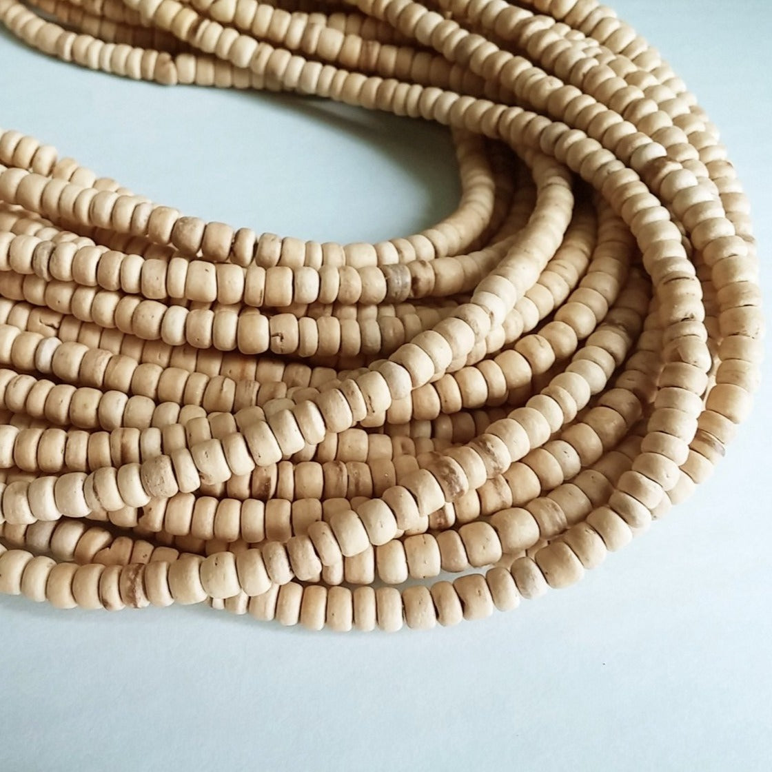 140 Natural marblized coconut wood Beads 4mm