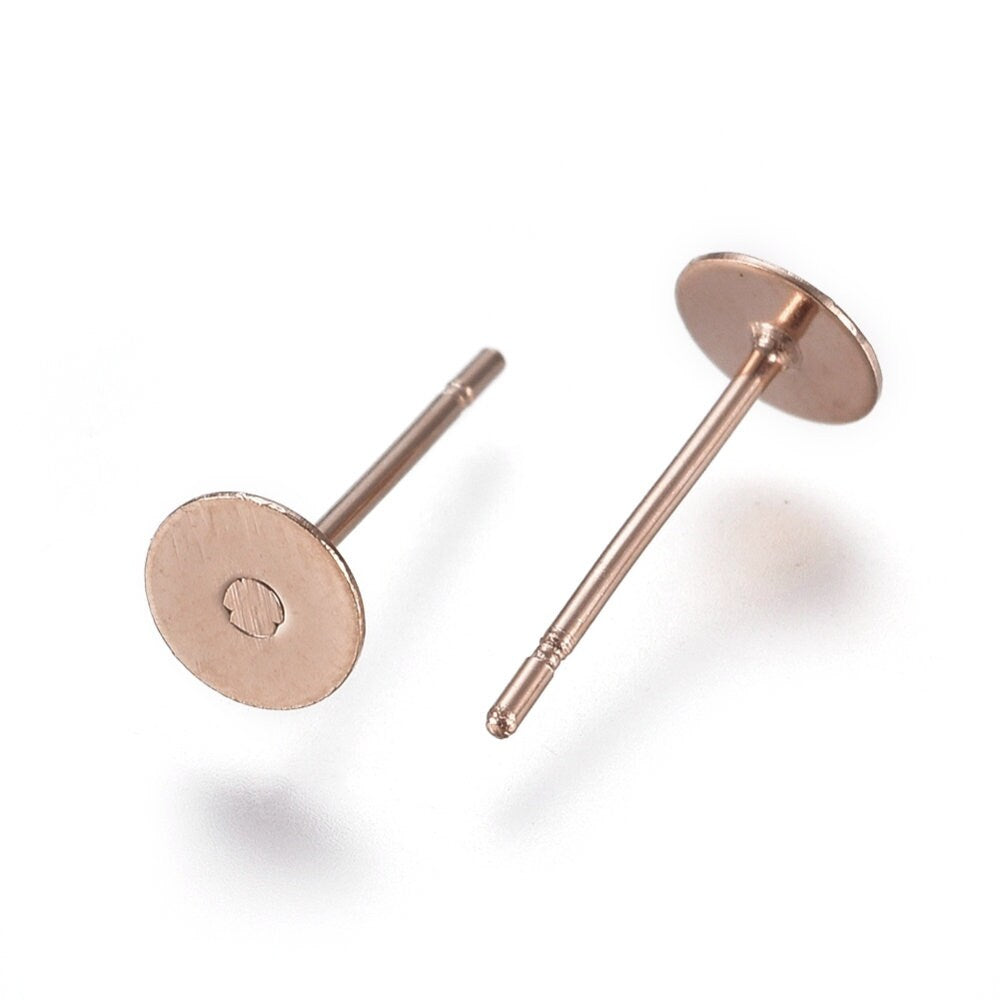 What's the purpose of the ball and spring on earrings hooks? : r
