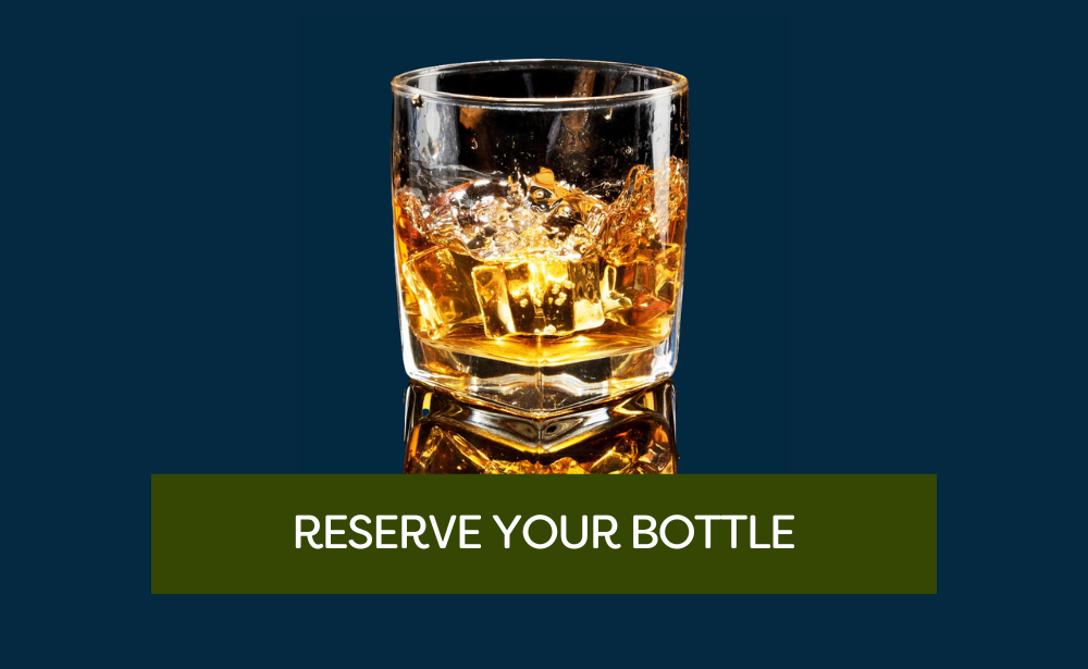 Picture of a glass of whiskey on the rocks. Reserve your bottle today.