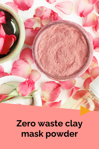 Pot of rose clay powder and petals