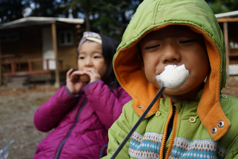 Little boy and girl eating smores