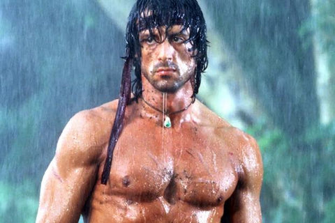 Rambo standing in the rain looking tough AF