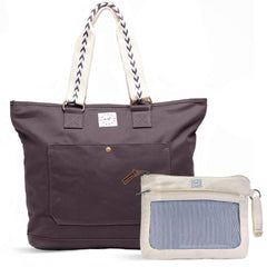 A large capacity canvas weekender Tote in graphite with embroidered shoulder straps, paired with a Pack-it-Up Pouch packing case in stone canvas.