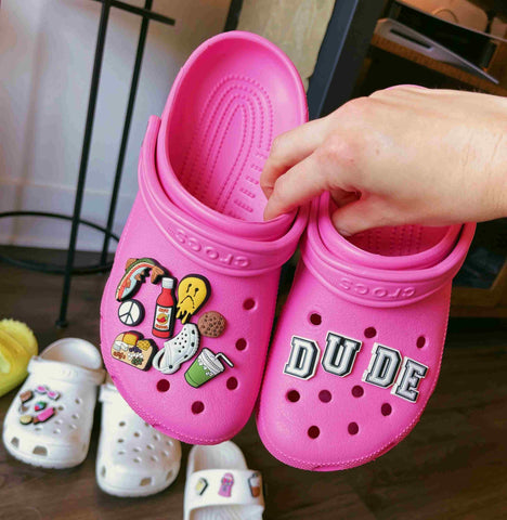 pink crocs clogs with charms