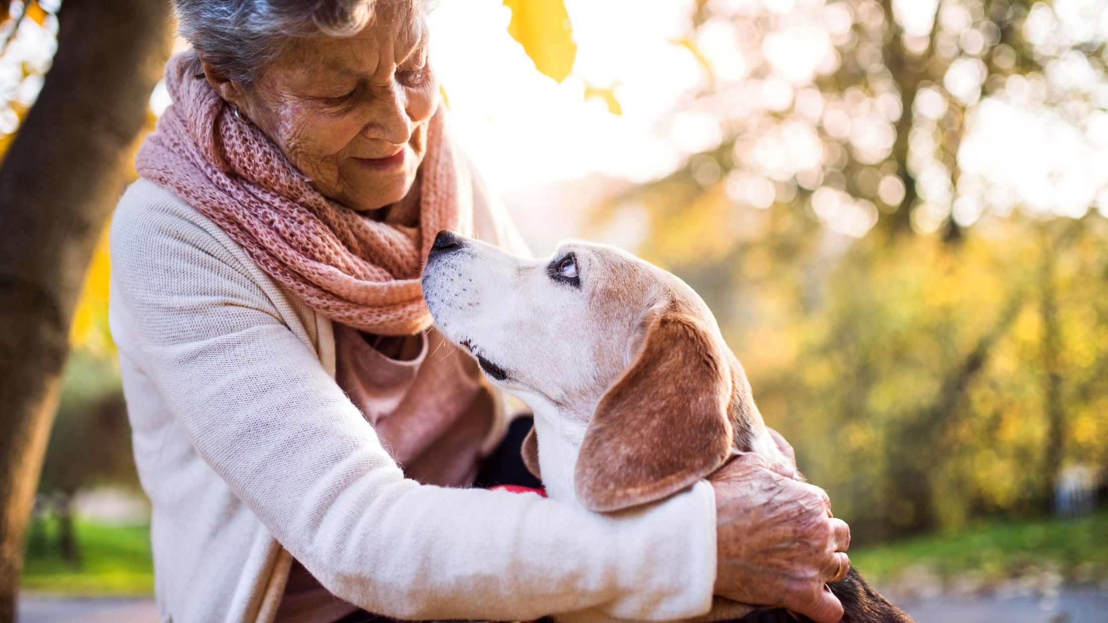 elderly woman with COPD holding dog