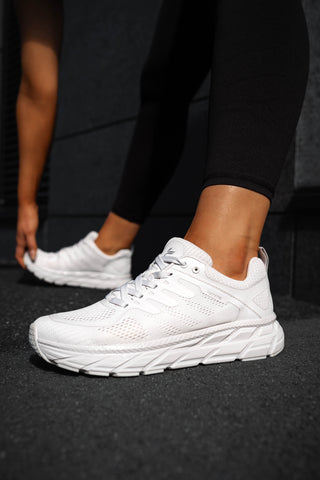 White running shoes with good stability