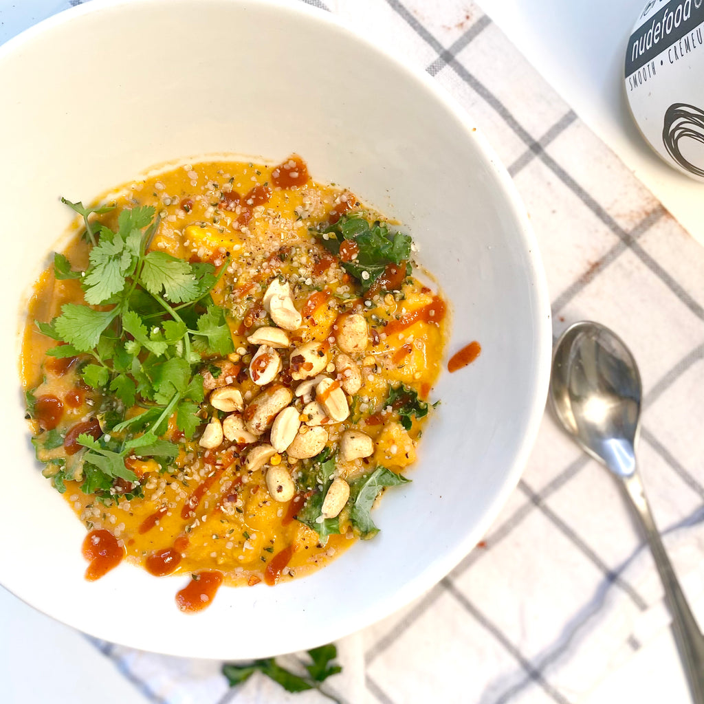 Natural peanut butter, sweet potato stew topped with roasted peanuts, sriracha, cilantro, and hemp hearts.