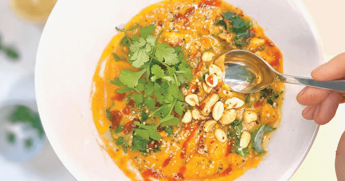 Bowl of sweet potato stew with garnishes