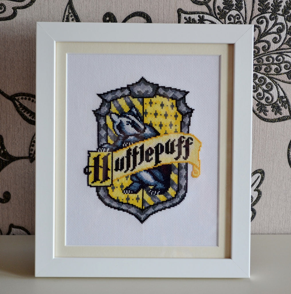 Get crafty with these faction crest cross-stitch patterns