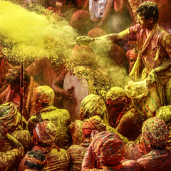 people covered in gulal in India for the Holi celebration