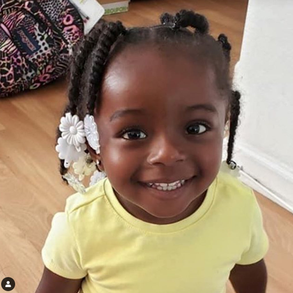 little girl wearing Protective Styles