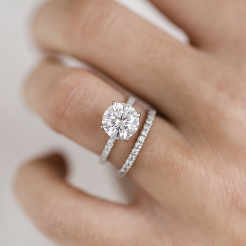 Round Cut Engagement Rings – East West 