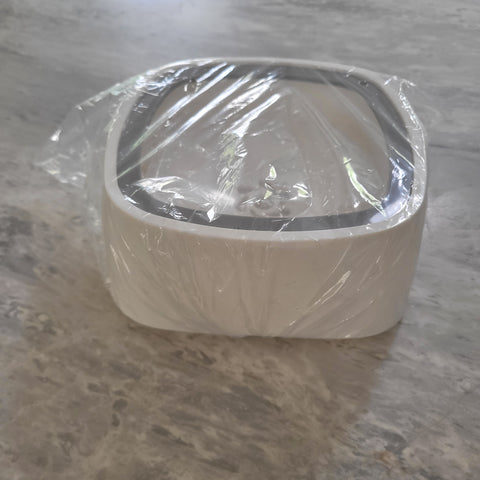 white non-splash dog water bowl in clear packaging