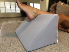 Bed Block used to elevate injured foot. Rest, ice, compression, elevation is the key to injury management