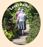 the shows two people walking in a garden with the heading 'level paths'